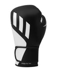 Black boxing glove with white accents on a white background