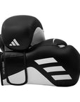 Black boxing gloves with white stripes on a white background