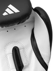 White boxing glove with black accents and Adidas logo on a white background