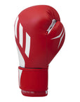 Red boxing glove with white accents on a white background
