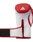 Red and white boxing glove with Adidas logo on a white background