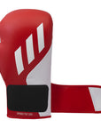 Red and white boxing glove with a brand logo on a white background