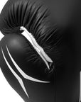 Black boxing glove with white accents on a white background