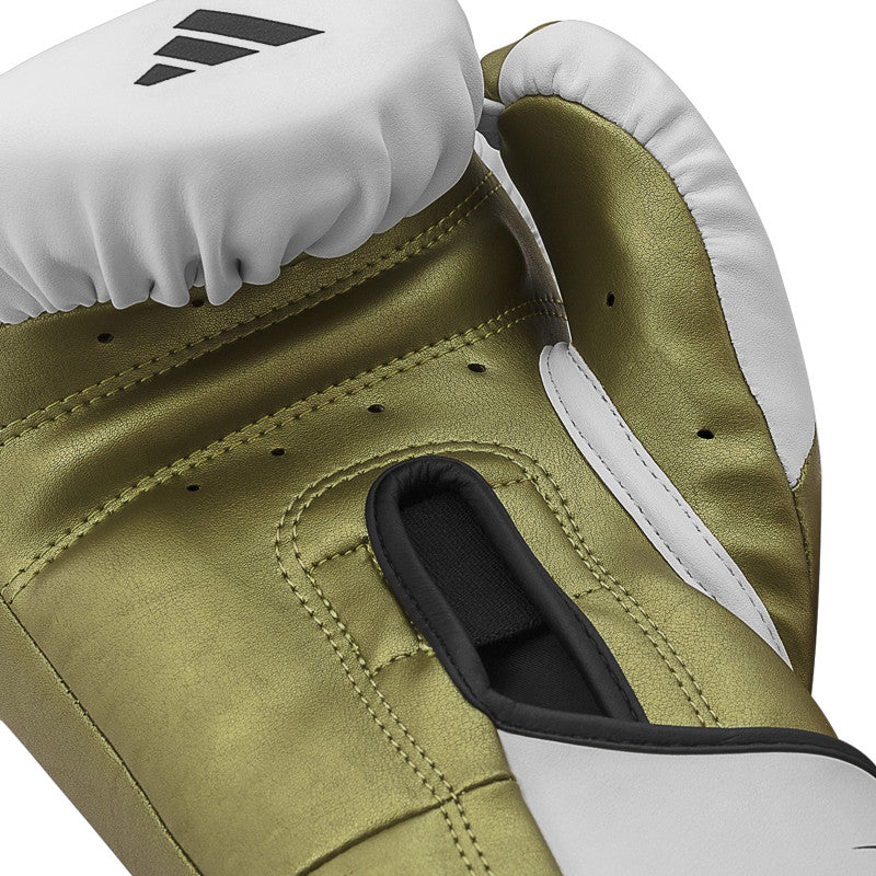 Close-up of a boxing glove's design.