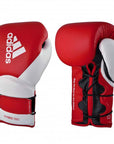 Red and white adidas boxing gloves, 14 oz size.