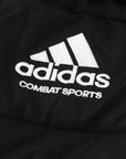 Close-up of a black adidas combat sports padded parka jacket.