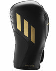 Black Speed TILT 150 boxing glove with gold stripes, 10 oz.