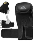 Black Adidas Speed Tilt 150 boxing glove with inner gloves.