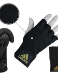 Adidas Speed Tilt 150 gloves with gloved hand demonstration.