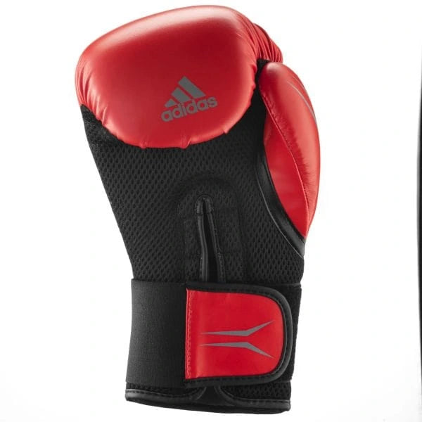 A red boxing glove, 12 oz, for training.