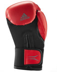 A red boxing glove, 12 oz, for training.