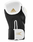 A black and Mat Black boxing glove with gold detail, 16 oz.