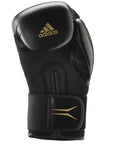 Black Speed TILT 150 boxing glove with gold logo, 8 oz.