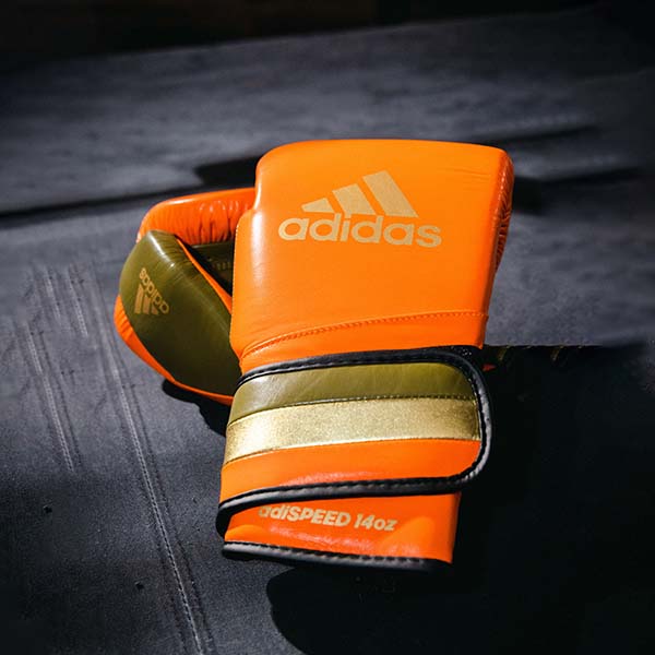 Orange boxing glove from adiSPEED 501 PRO collection.