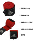 Red and black bandages for boxing hand protection.