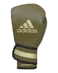 Green boxing glove with gold stripes, limited edition adiSPEED 501 PRO.