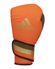 Boxing glove with gold trim, limited edition adiSPEED 501 PRO for all genders.