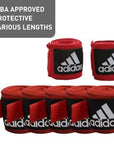 Group of red and black bandages for boxing protection.