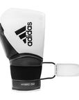 Boxing glove featuring a prominent logo.