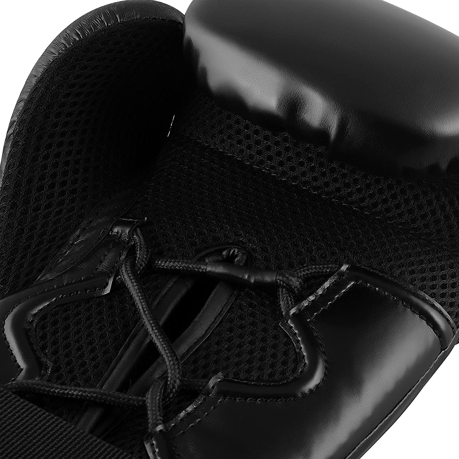 Close-up view of a black boxing glove, 8 oz size.