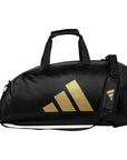 Black Adidas bag with a gold logo.