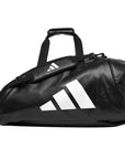 Black bag with a large white Adidas logo.