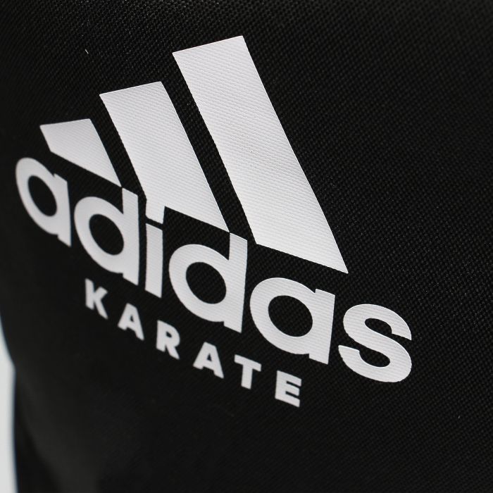 Close-up of black Adidas backpack designed for Karate training.