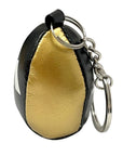 Close up of Adidas Speedball Mini Keychain in black and gold.