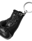 Boxing glove keychain on white background.