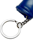 Close up of adidas keychain featuring blue boxing glove.