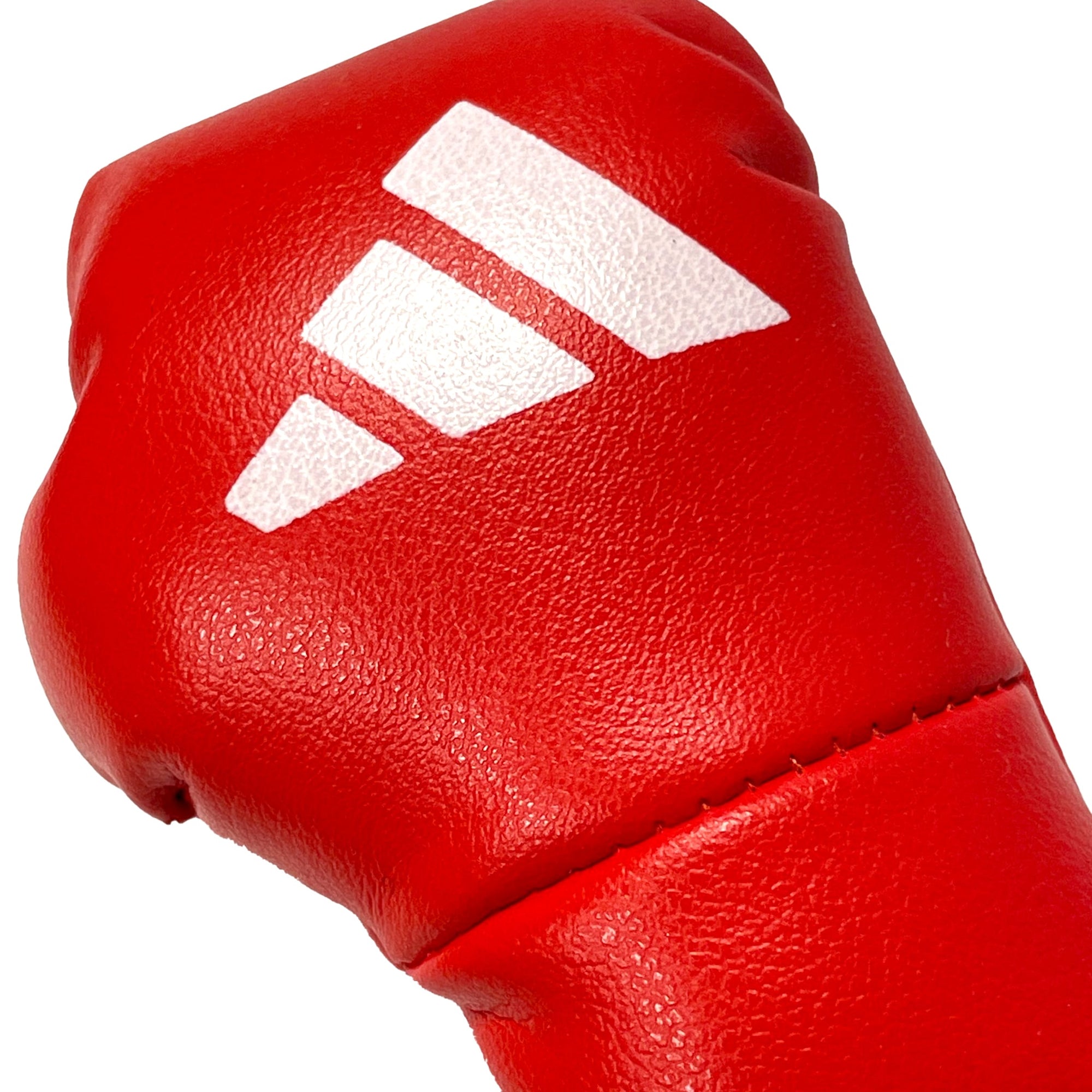 Red adidas boxing glove keychain with white logo.