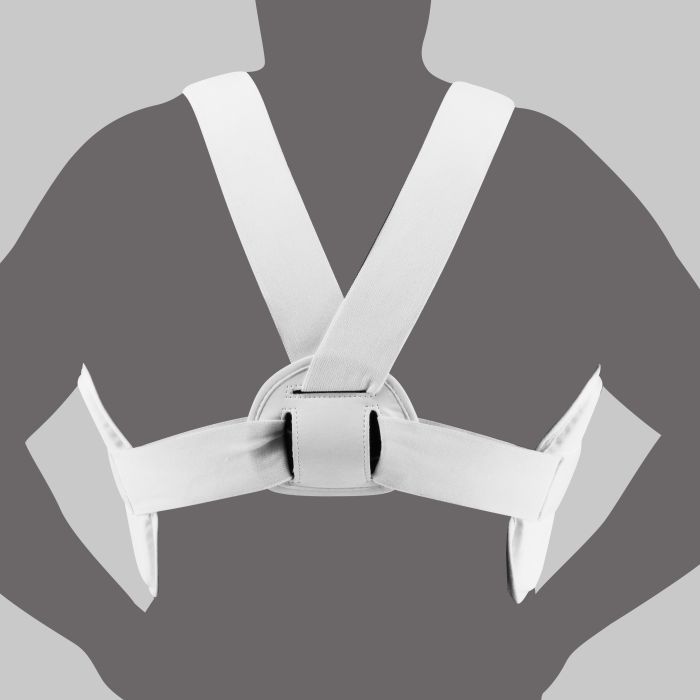 Person wearing karate uniform with white belt.