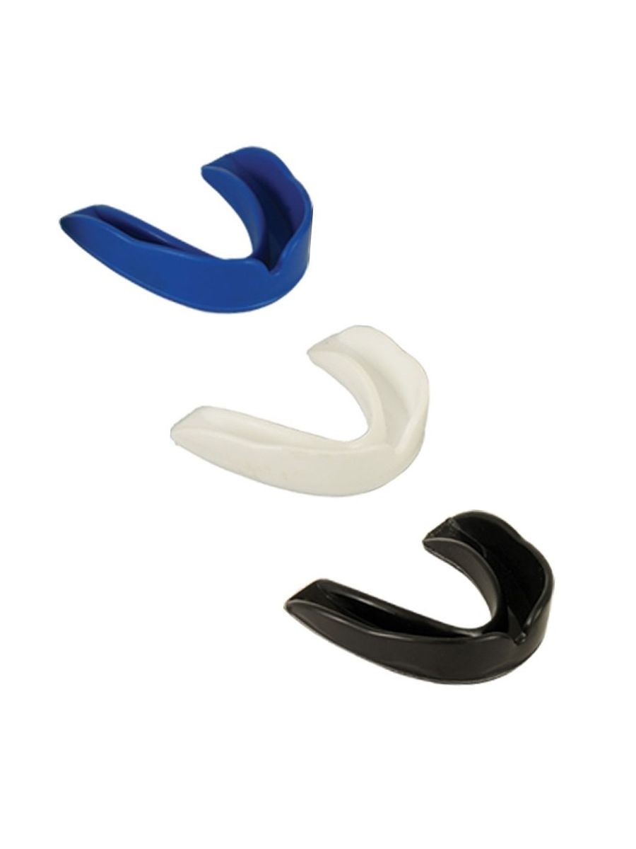 Close-up of several mouth guards for karate protection.