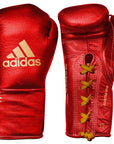 Red adidas boxing gloves, gold/black, 8 oz.