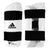 A pair of black and white Adidas vinyl forearm guards for sparring.