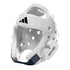 White Adidas taekwondo foam head guard with black accents and multiple ventilation holes.