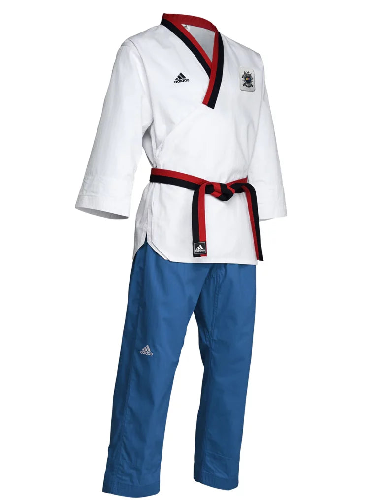 White karate uniform with blue pants from Adidas Poomsae.