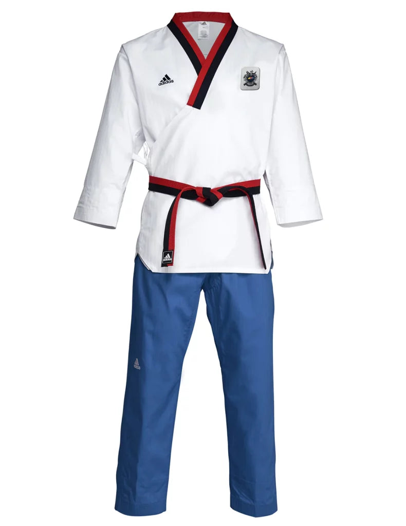 White and blue karate uniform by Adidas for youth males.