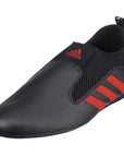 Black and red adidas laceless taekwondo shoes.