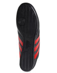 Black and red adidas laceless taekwondo shoe.