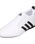 White adidas taekwondo shoe with black stripes.