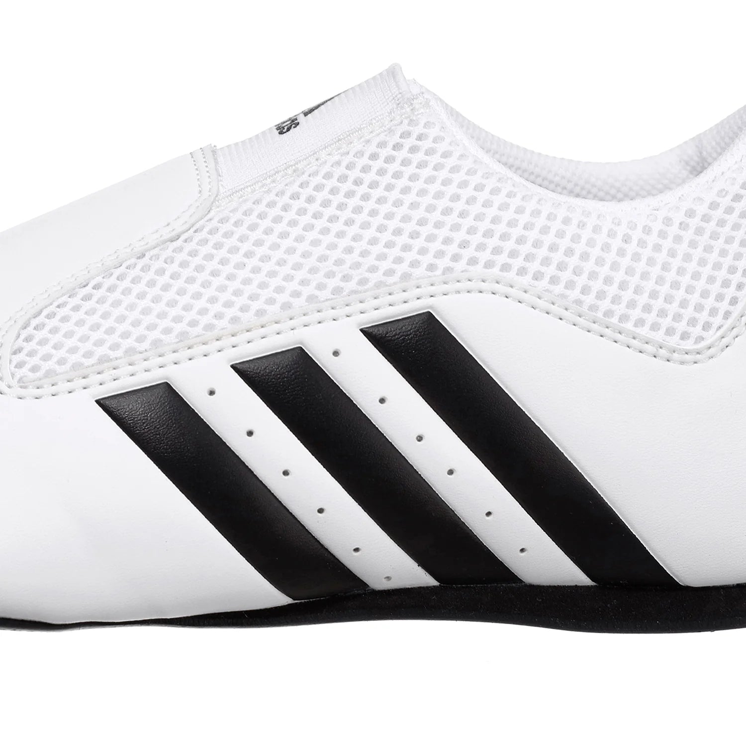 White and black adidas taekwondo shoe.