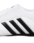 White and black adidas taekwondo shoe.