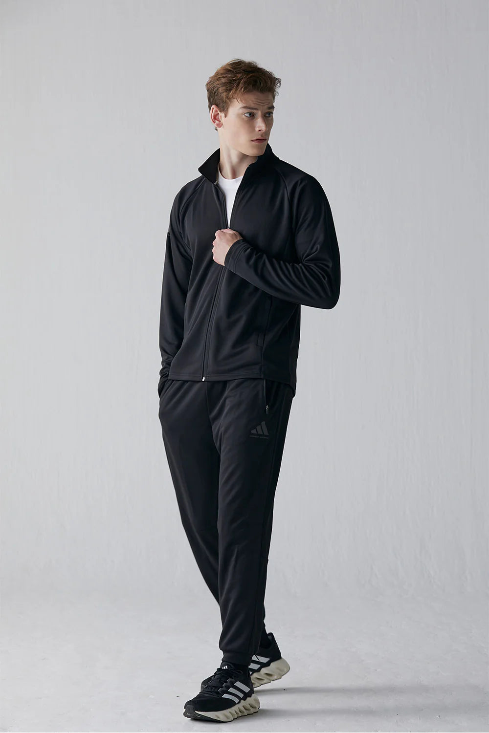 Man dressed in black jacket, Adidas Combat Sports Training Suit Set 2XL.