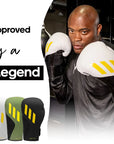 A man wearing Adidas x Anderson Silva Tilt150 boxing gloves.