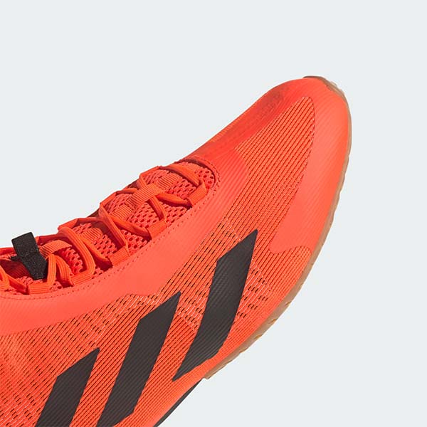 Close up of Speedex Ultra boxing shoe in red and black, size M10/W11.