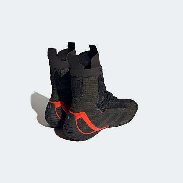 Black and orange Speedex 23 boxing shoes.