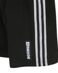 Close-up of ADIDAS traditional boxing shorts in black and white.