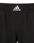 Black Adidas shorts with visible logo.