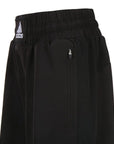 Black shorts featuring a white logo.